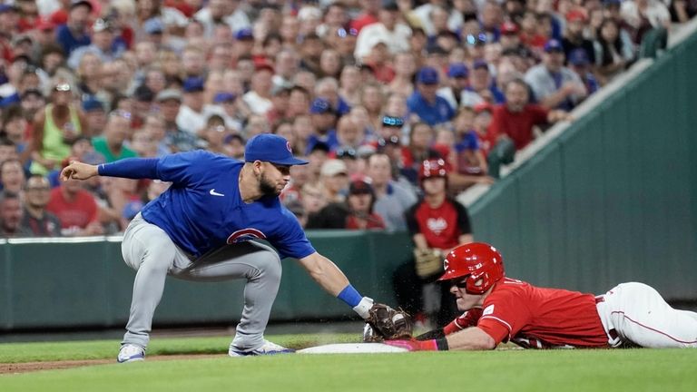 Reds rally in 9th inning again, edge Cubs 2-1