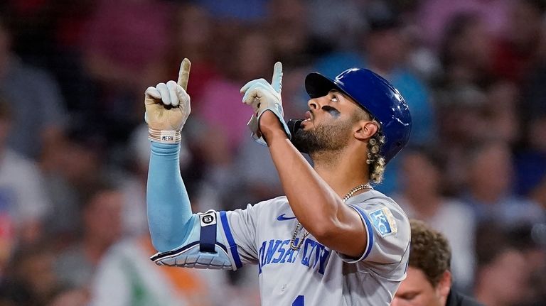 Royals run wild on Red Sox; Story shows rust in return