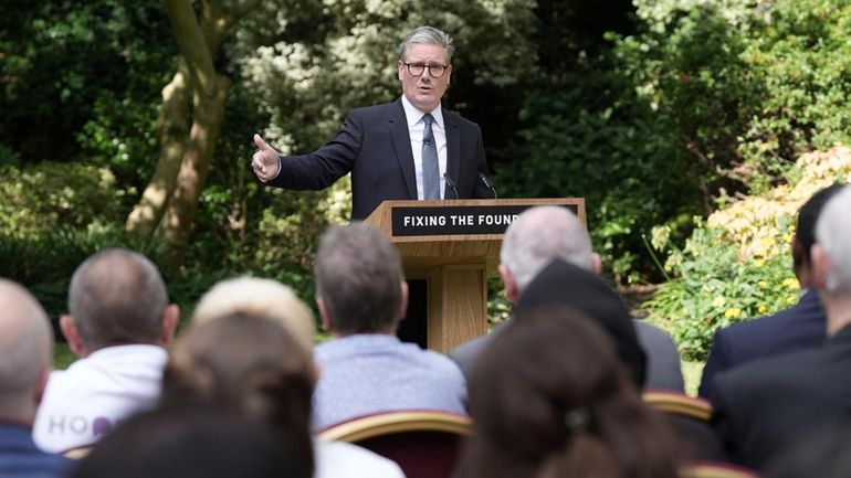 Britain's Prime Minister Keir Starmer delivers a speech and press...