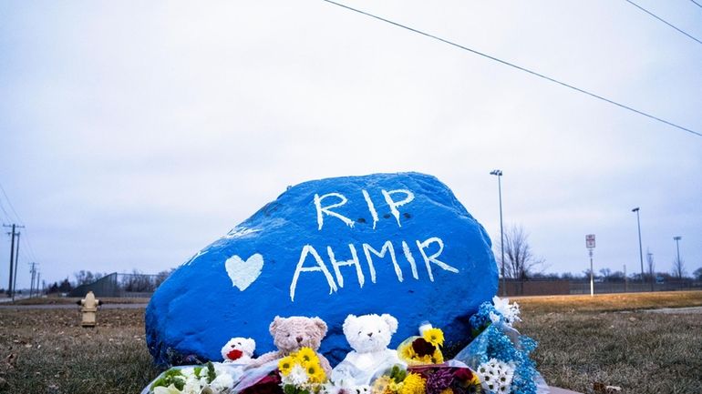 A rock is painted to memorialize Perry High School shooting...