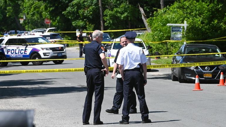 Suffolk police at the scene Wednesday in North Bellport where a man...