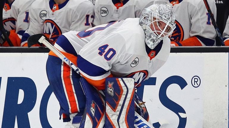 Islanders goaltender Robin Lehner reacts before a shootout against the Bruins at TD...