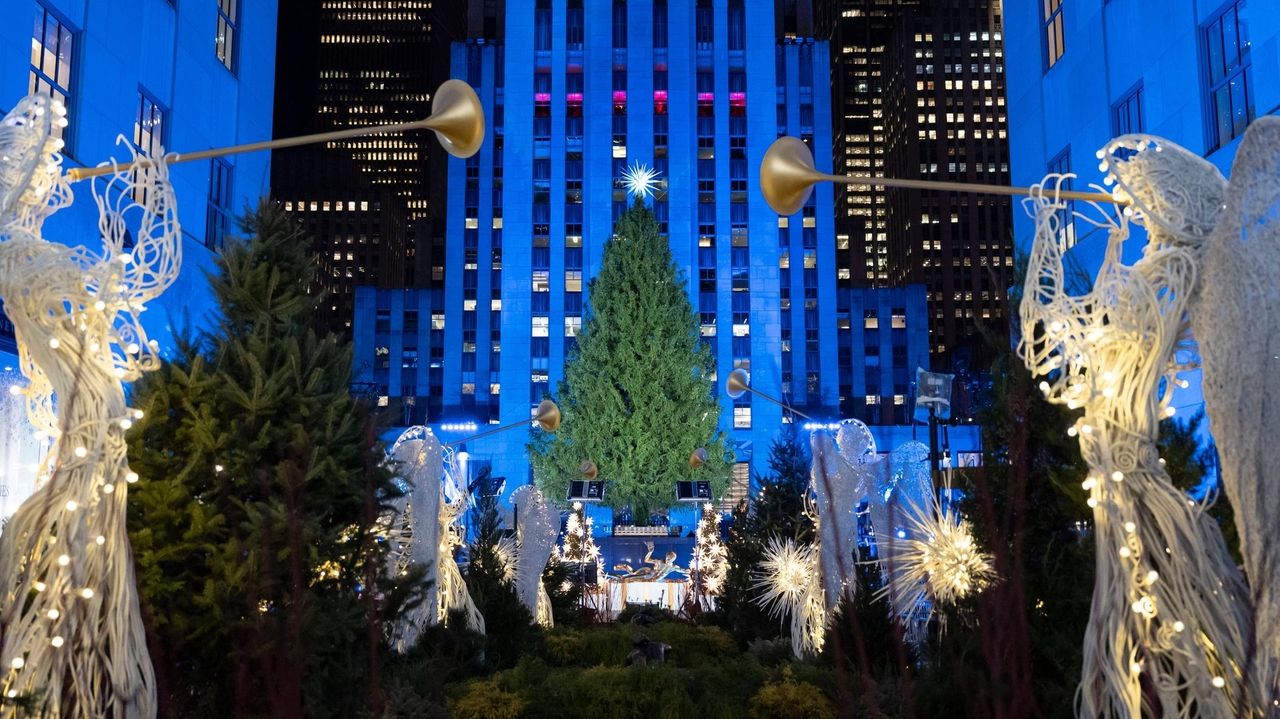 The Rockefeller Center Christmas tree, a holiday icon, is illuminated in New York