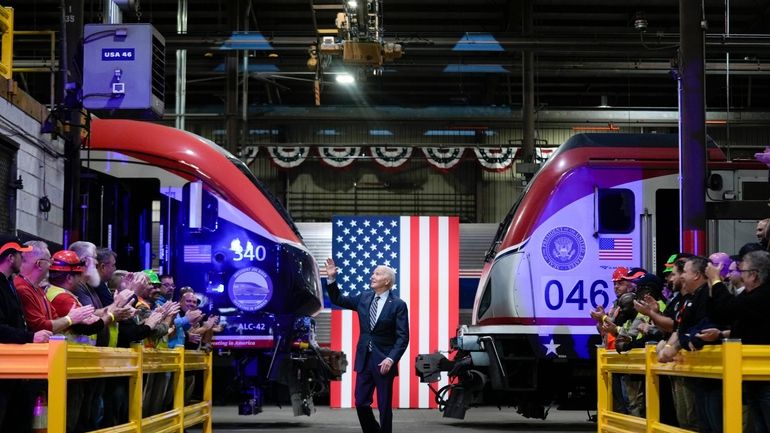 President Joe Biden arrives to speak at the Amtrak Bear...