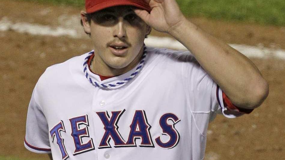 Texas Rangers starting pitcher Derek Holland during a baseball