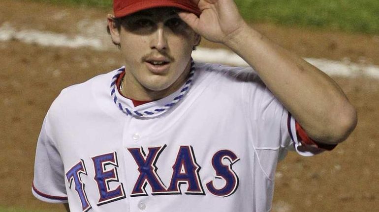 Derek Holland Strikes Out 11 as Rangers Blank Orioles - The New