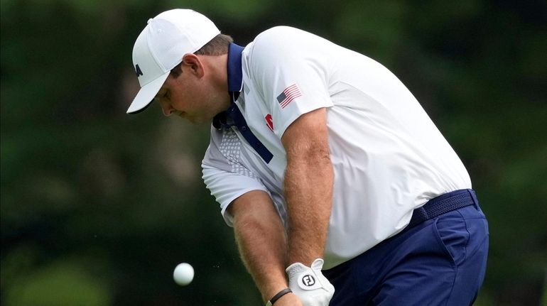 Patrick Reed plays a shot from the second fairway during the...