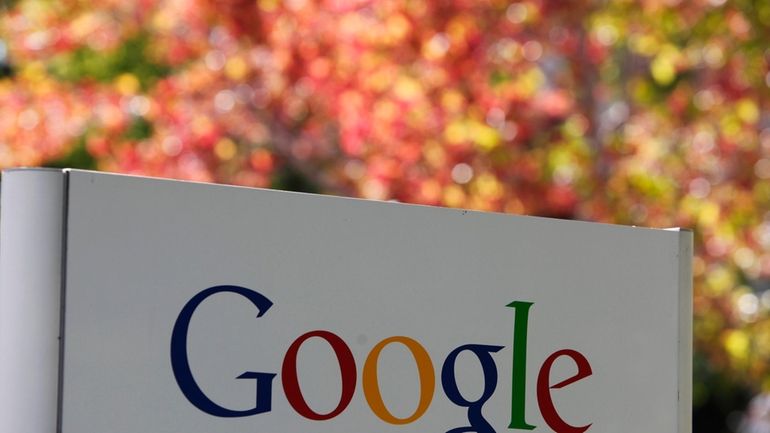 A sign at Google headquarters in Mountain View, Calif. is...