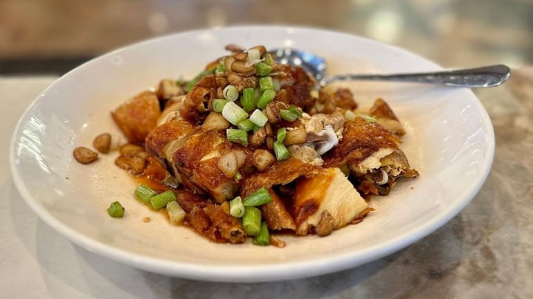 Fried chicken with roasted garlic at Orient Garden in New...