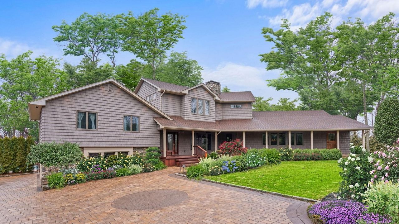 Renovated Dix Hills home with pool lists for almost 2 million Newsday