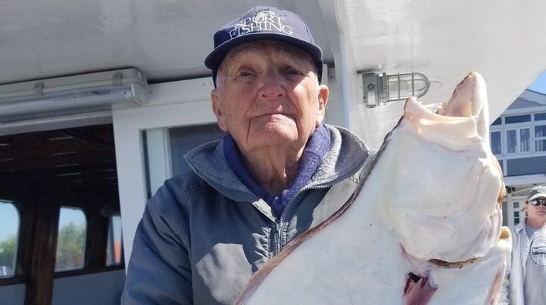 Ed Friswold, 92, of Islip Terrace, poses with an 8...