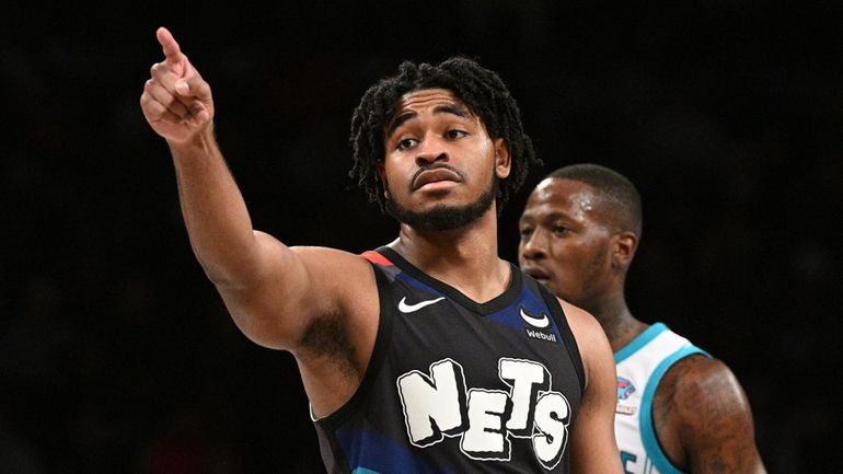 Brooklyn Nets guard Cam Thomas gestures in the second half...