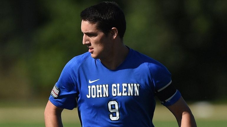 Glenn forward Anthony Randazzo moves the ball downfield during the first...