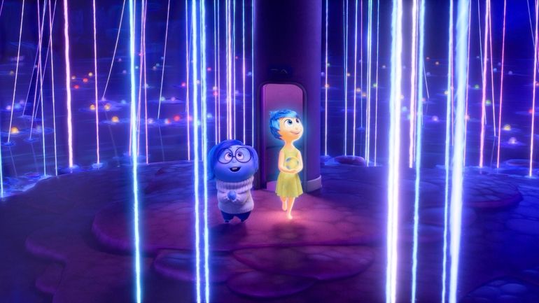 This image released by Disney/Pixar shows, from left, Sadness, voiced...