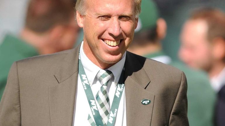 John Idzik looks on before a game against the New...