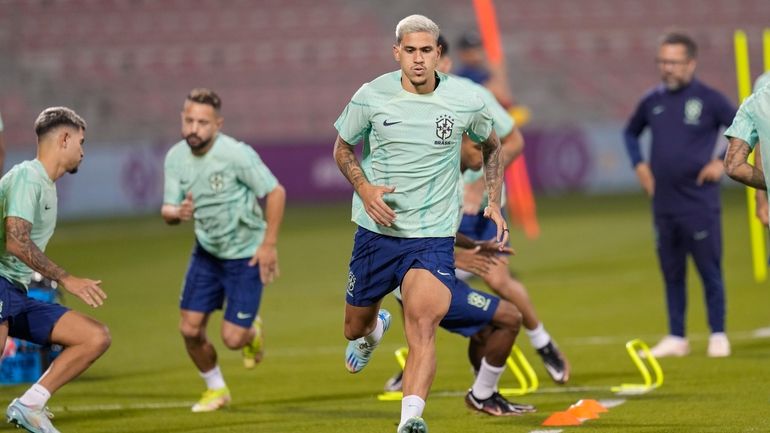 Brazil's Pedro exercises during a training session at the Grand...