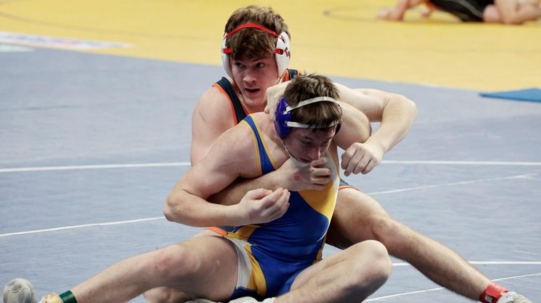 Greyson Meak of Cold Spring Harbor wrestles in a 190-pound Division...