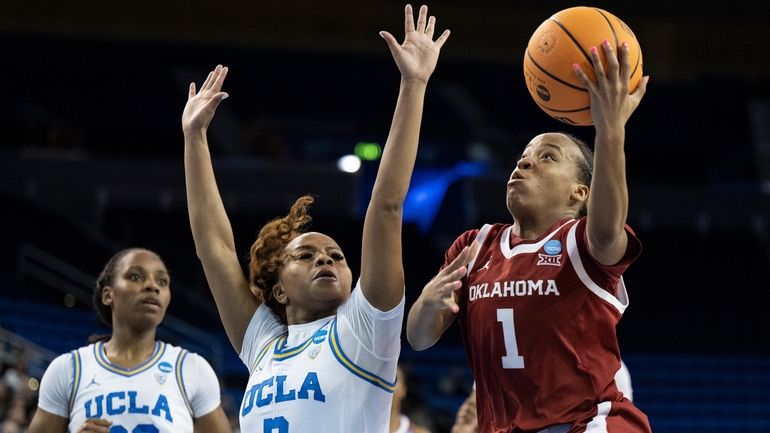 Oklahoma guard Nevaeh Tot (1) shoots over UCLA guard Londynn...