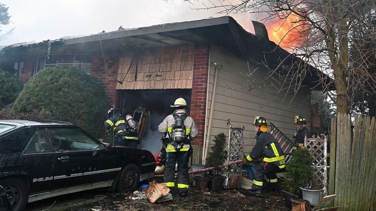 The fire on Wednesday critically injured an occupant, officials said.