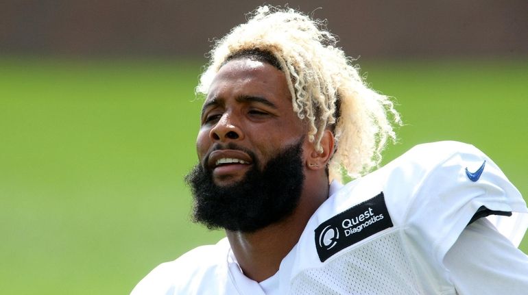 Giants wide receiver Odell Beckham Jr. (13) stretches during training...