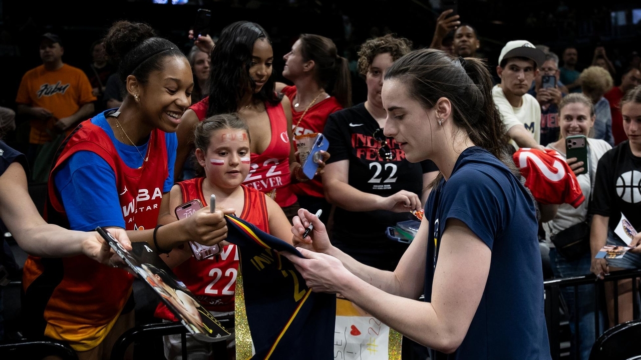 Liberty's Breanna Stewart helps club rally past Caitlin Clark, Indiana Fever
