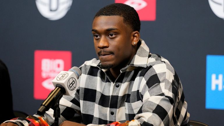 Dariq Whitehead speaks to the media at the Nets training facility...