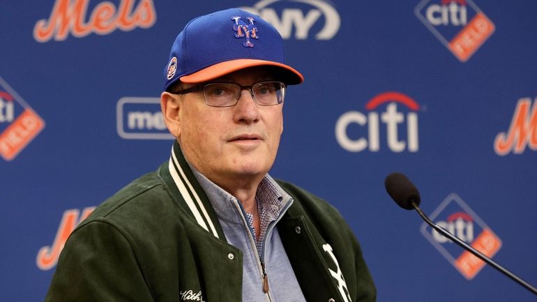 Mets owner Steve Cohen speaks to the media before a...