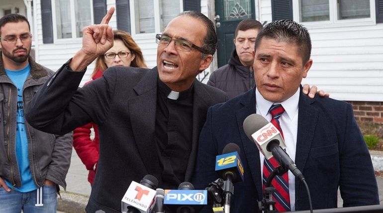 The Rev. Allan Ramirez, left, and Joselo Lucero voice opposition...