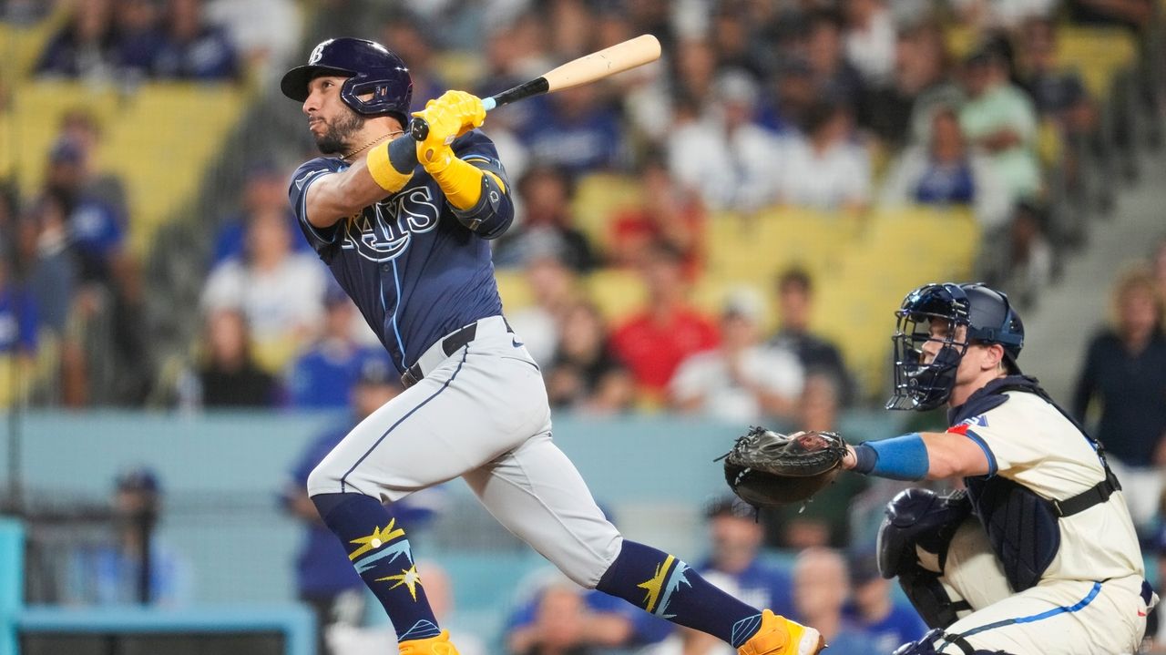 Caballero’s 2-run home run against Kelly in the 10th inning helps the Rays to a 9-8 victory over the Dodgers