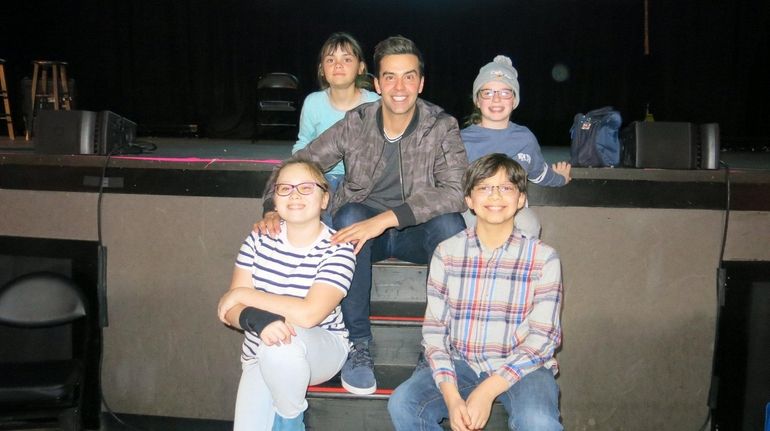 Actor and magician Michael Carbonaro with Kidsday reporters Sonia Koncelik,...