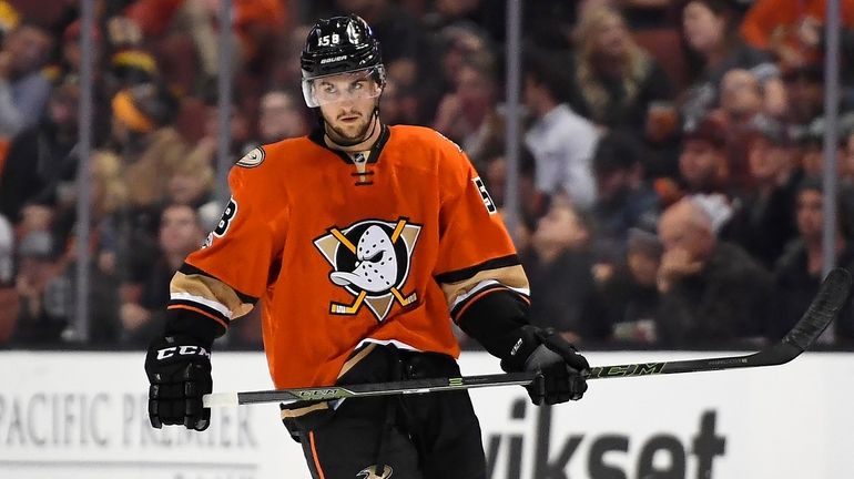 Anaheim Ducks left wing Nicolas Kerdiles stands on the ice...