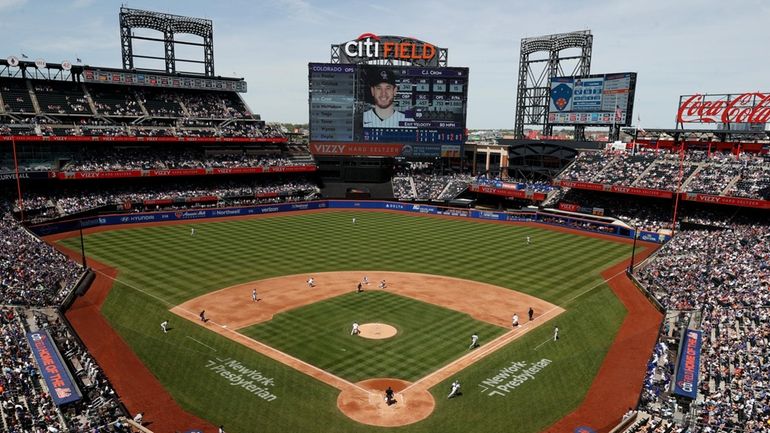 General view as C.J. Cron #25 of the Colorado Rockies...