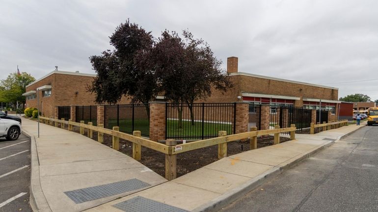 The Washington Avenue side of Mineola High School on Friday. The school had...