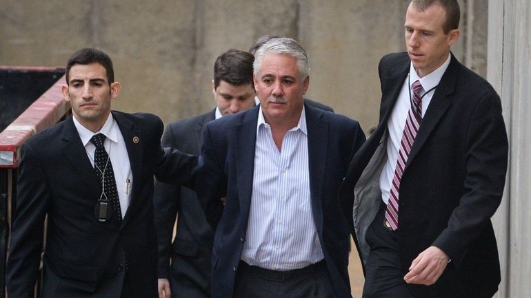 Former Suffolk County police chief of department James Burke is...