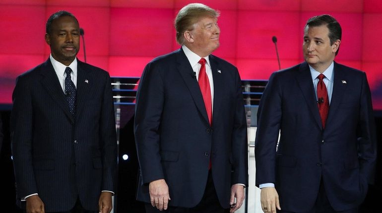 Republican presidential candidates Ben Carson, Donald Trump and Sen. Ted...