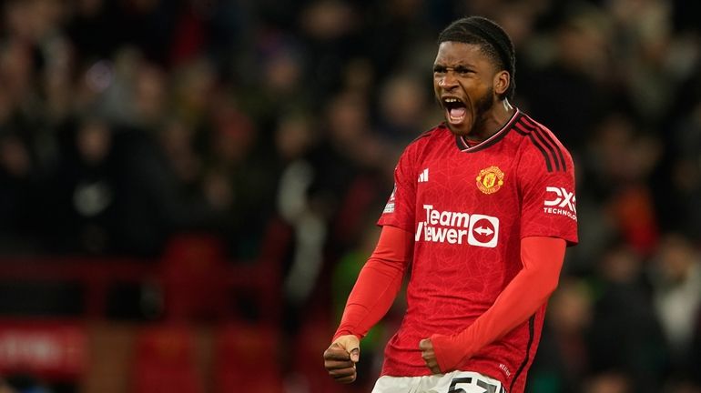 Willy Kambwala celebrates during the English Premier League soccer match...