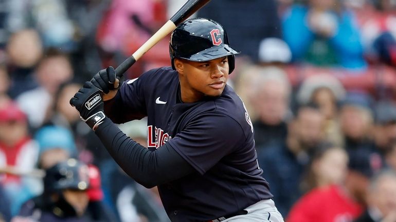 Cleveland Guardians' Oscar Gonzalez plays against the Boston Red Sox...