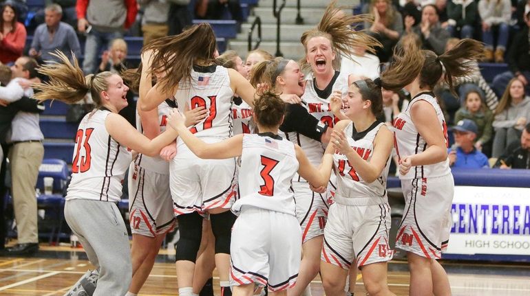 Mt Sinai players celebrate their win over Westhampton in the Suffolk...