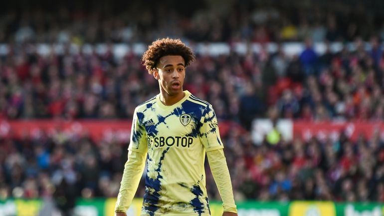 FILE - Leeds United's Tyler Adams stands on the pitch...