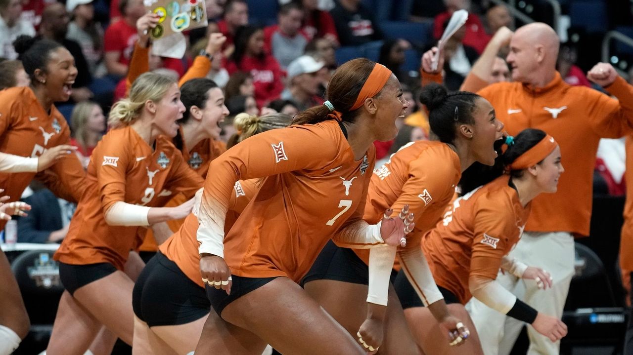 Skinner's record 6 aces lead defending champion Texas past Wisconsin 3-1 in NCAA semifinal