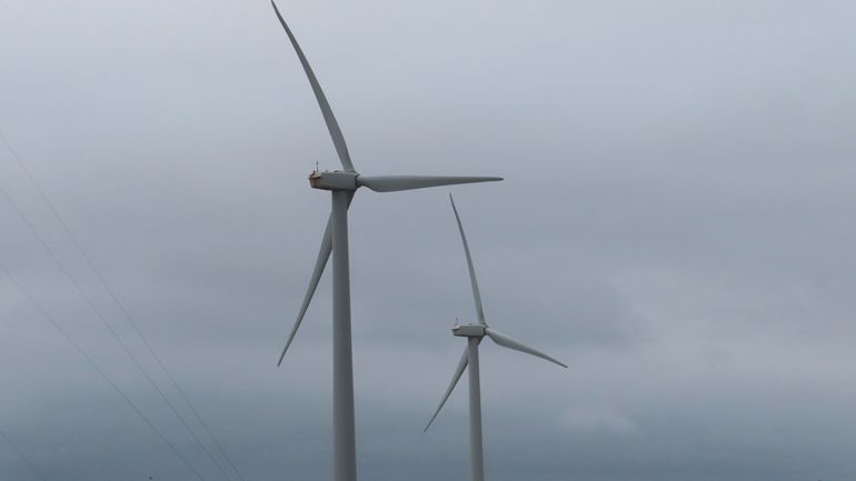 Land-based wind turbines spin in Atlantic City, N.J., on Wednesday,...