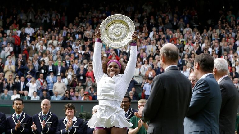 Serena Williams of the United States, center, celebrates with the...