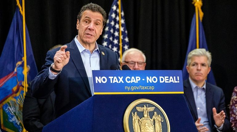 Gov. Andrew M. Cuomo, with Suffolk County Executive Steve Bellone and...