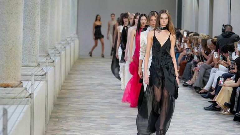 Models wear creations as part of the Alberta Ferretti Spring...