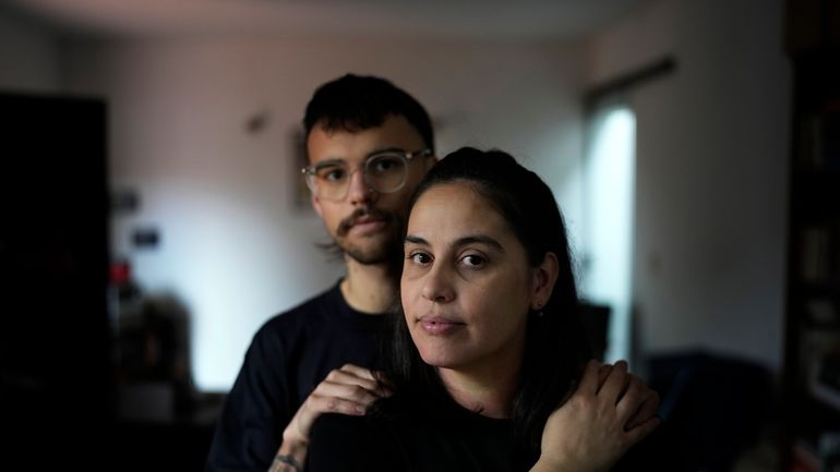 Diana Zalazar and her son Ato Martino pose for a...