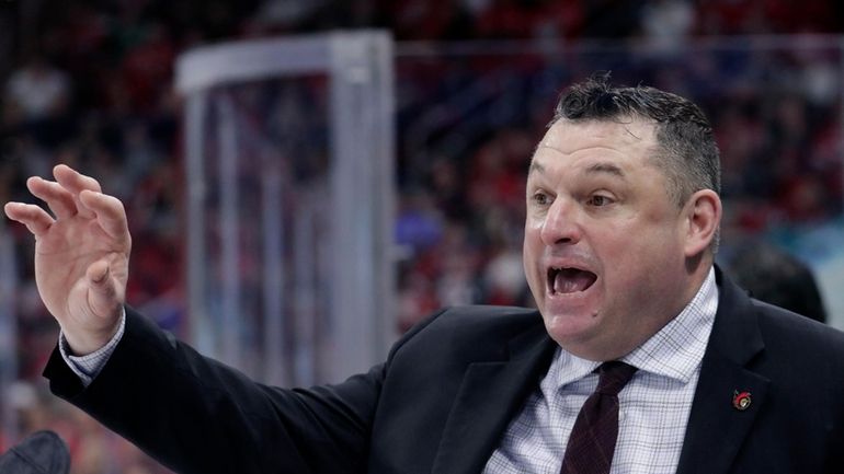 FILE -Ottawa Senators head coach D.J. Smith directs the team...