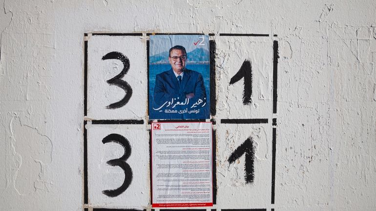 An election banner for presidential candidate Zouhair Maghzaoui is pictured...