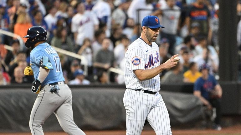 Mets starting pitcher Justin Verlander reacts as Tampa Bay Rays'...