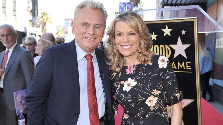 Pat Sajak, left, and Vanna White, from "Wheel of Fortune,"...