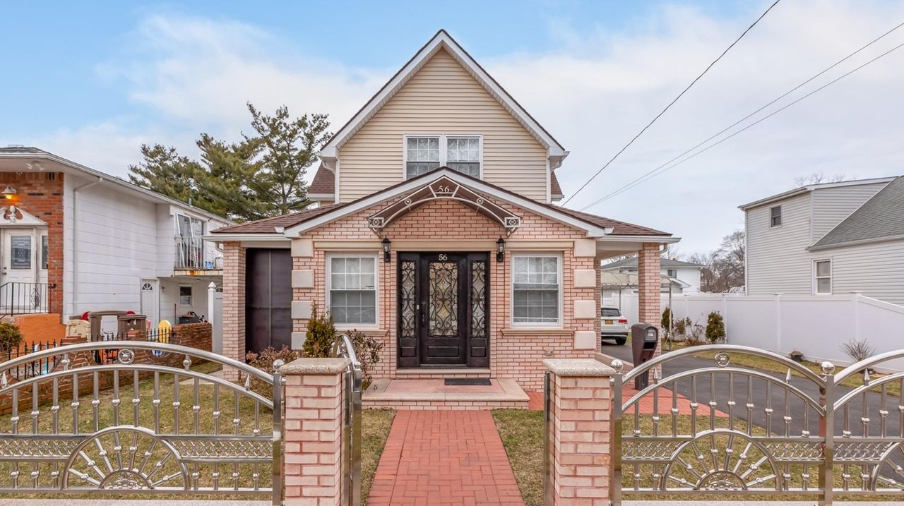 New Hicksville Colonial with low taxes on the market for 1.2 million